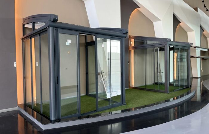 TECTONA ARC SLIDING GLASS
